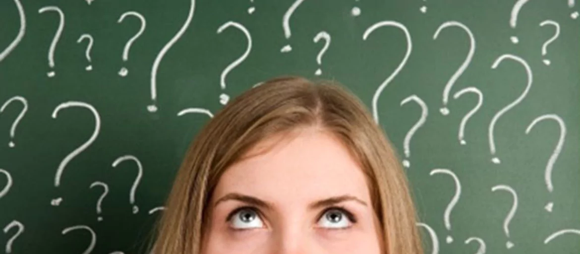 a girl's face with question marks